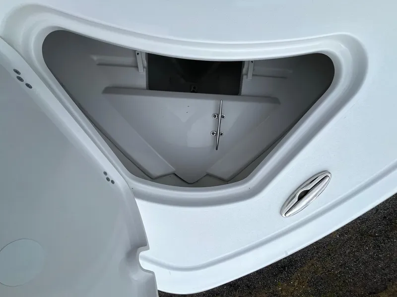 Slide: The Image of 2025 Sportsman Open 232 Center Console anchor locker detail. - 16