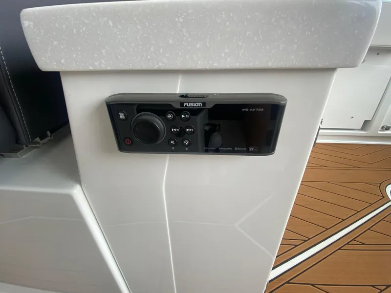 Slide: The Image of Fusion audio system on 2022 Monterey 385 Super Sport boat interior. - 28