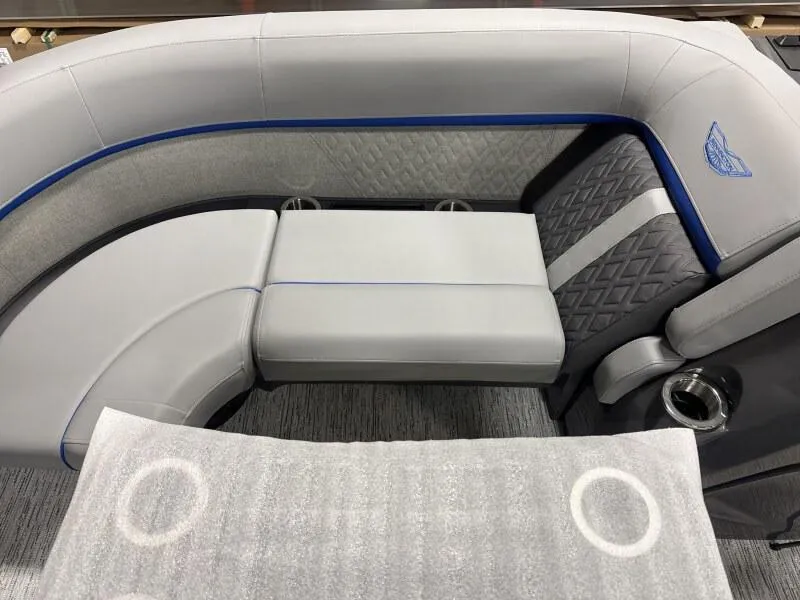 Slide: The Image of Luxurious seating on 2025 Bennington 22 MFB boat, featuring elegant gray upholstery and modern design. - 10