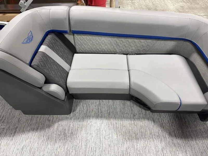 Slide: The Image of 2025 Bennington 22 MFB boat seating with gray upholstery and blue accents. - 14