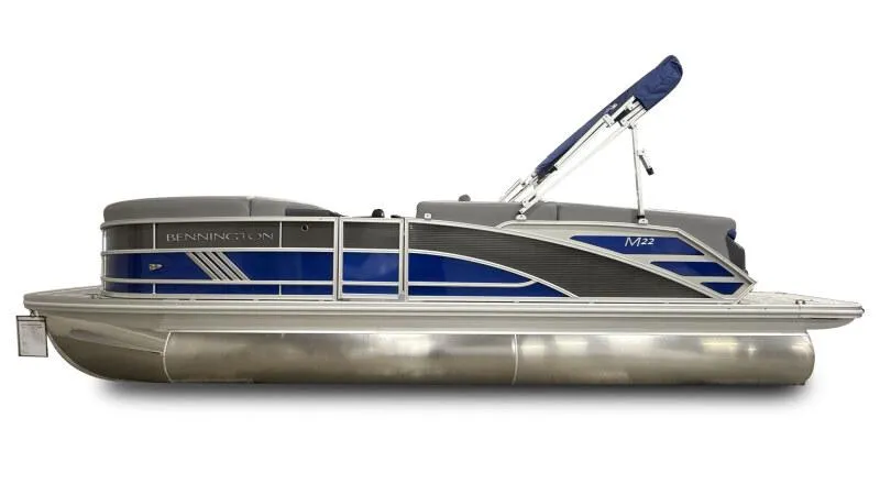 Slide: The Image of 2025 Bennington 22 MFB pontoon boat, sleek design, blue and gray accents, side view. - 4