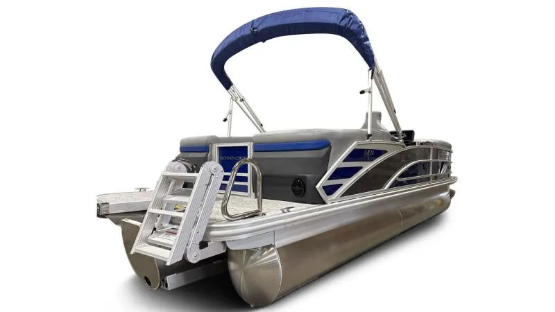 Slide: The Image of 2025 Bennington 22 MFB pontoon boat with blue canopy and sleek design. - 7