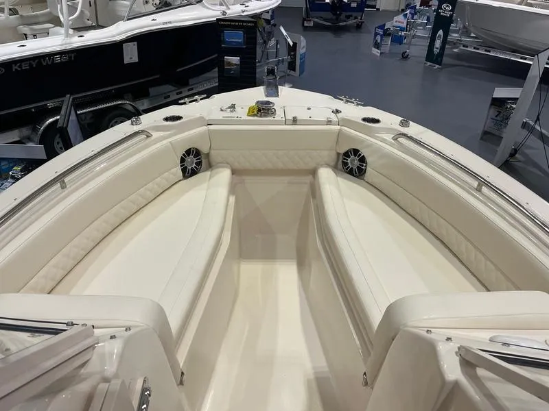 Slide: The Image of 2025 Grady-White Freedom 255 boat interior with spacious seating and modern design. - 9