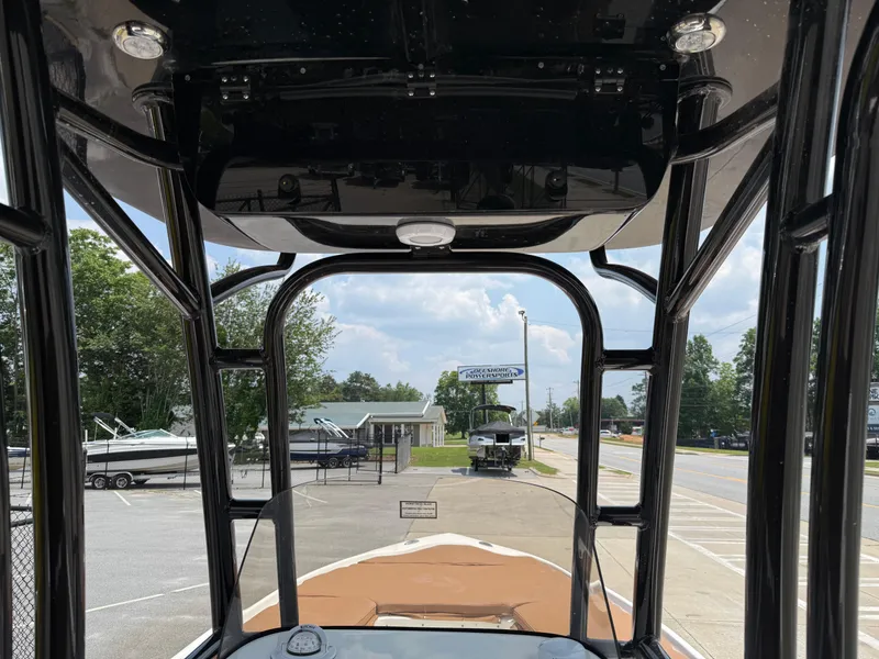 Slide: The Image of 2025 Key West 250BR boat livewell with open lid, showcasing interior design. - 21