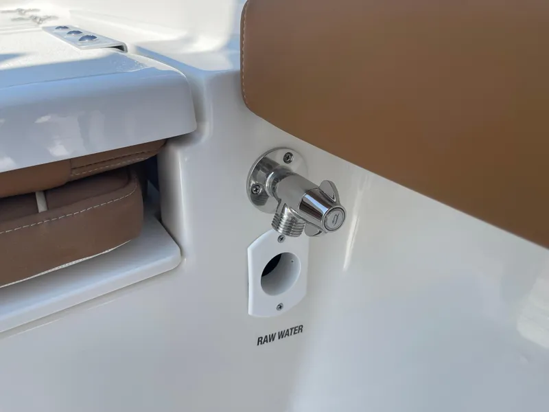 Slide: The Image of 2025 Key West 250BR boat seat with brown leather upholstery and diamond stitching. - 27