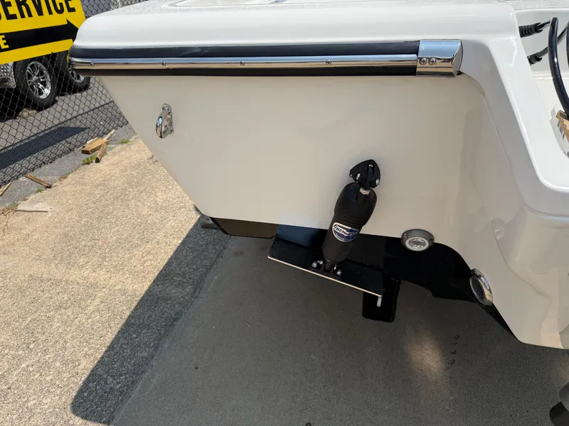 Slide: The Image of Close-up of a 2025 Key West 250BR boat detail with metal fittings and hydraulic component. - 38