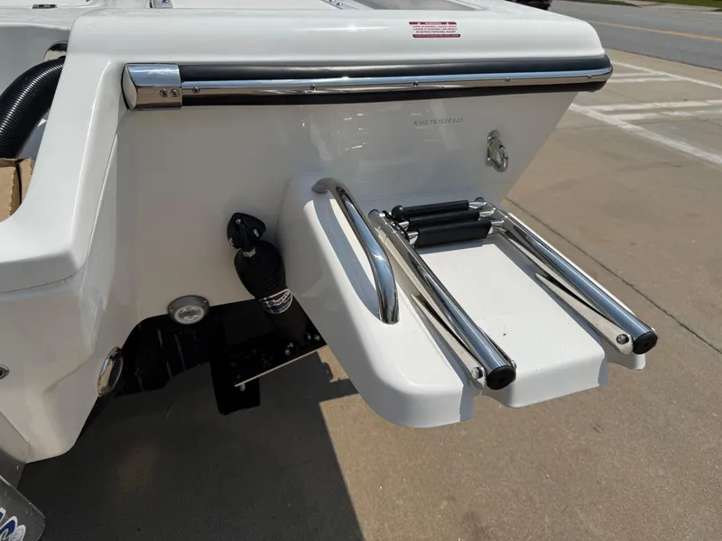 Slide: The Image of 2025 Key West 250BR boat with stainless steel swim ladder and platform. - 41