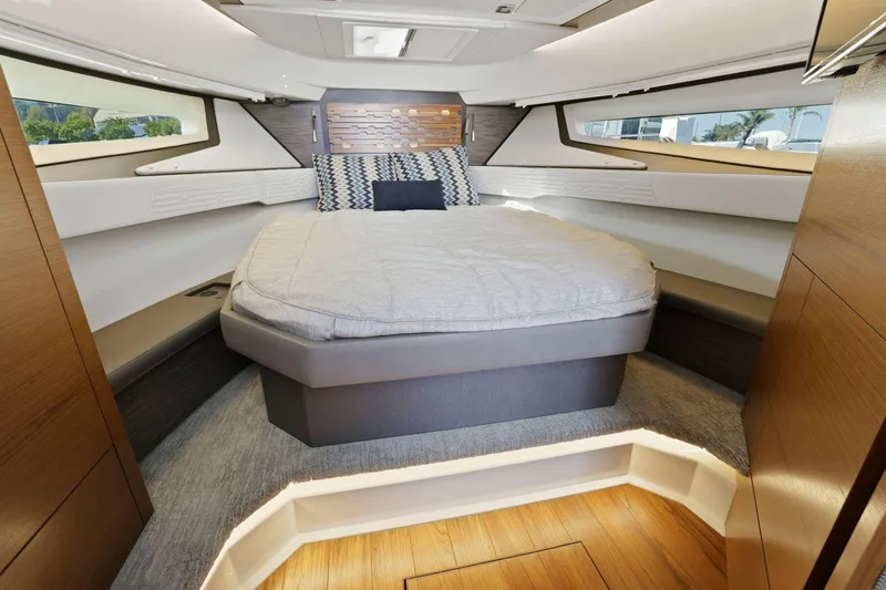 Slide: The Image of 2022 Tiara Yachts 43 LE cabin interior with bed and modern design. - 29