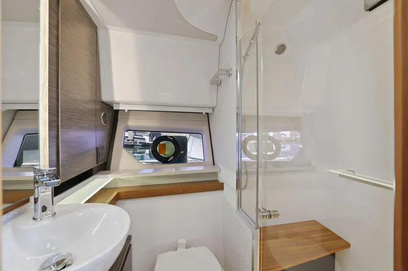 Slide: The Image of Modern bathroom interior of 2022 Tiara Yachts 43 LE with sleek design and wooden accents. - 33