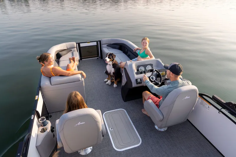 Slide: The Image of 2026 Barletta Aria 22 UC pontoon boat on calm water with passengers. - 1