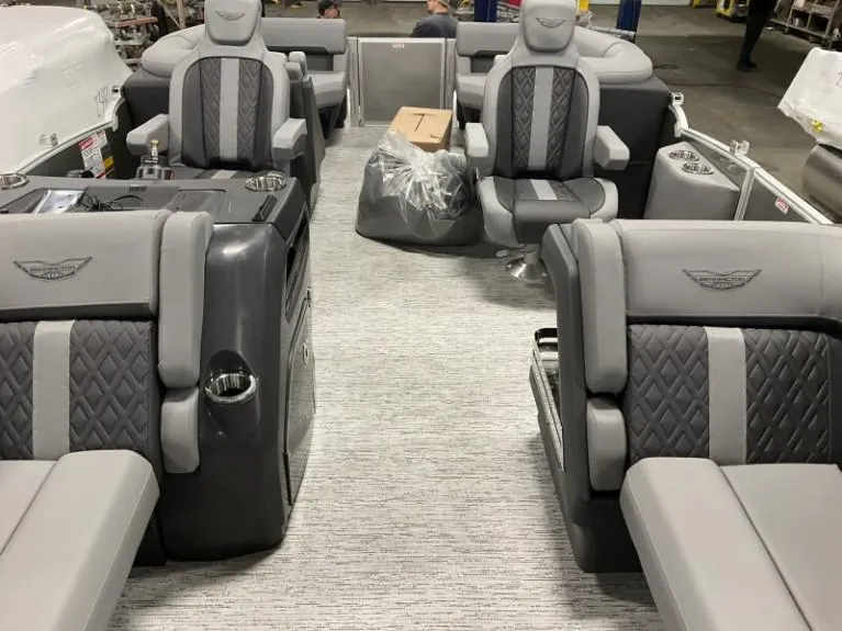 Slide: The Image of 2025 Bennington 22 MFB boat interior with luxurious gray seating and modern design. - 6