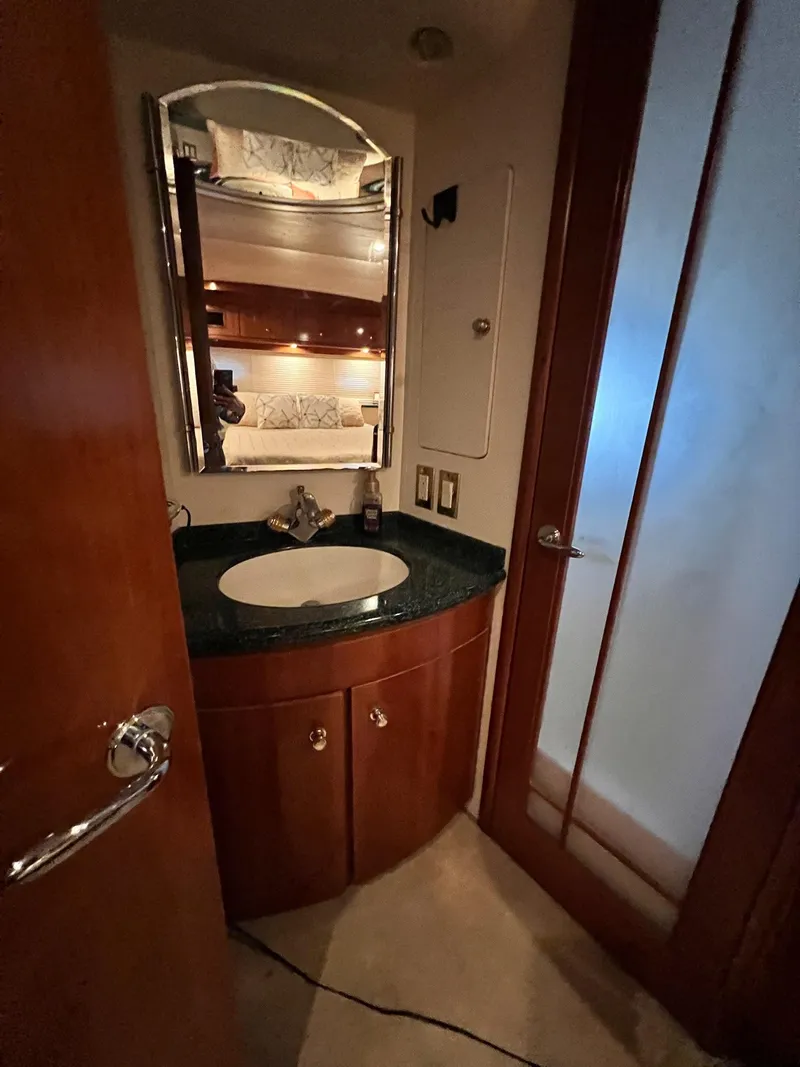 Slide: The Image of Bathroom interior of 2000 Carver 506 Motor Yacht with sink and mirror. - 20