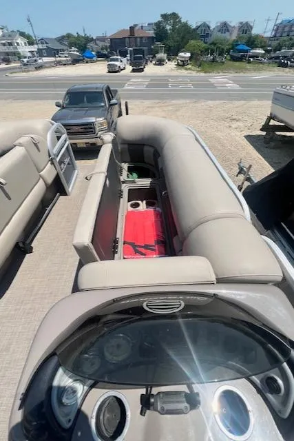 Slide: The Image of 2021 Sun Tracker Party Barge 20 DLX pontoon boat with spacious seating and storage. - 14
