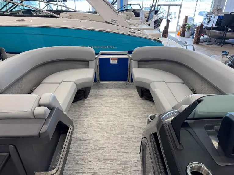 Slide: The Image of 2025 Bennington 22 MSB pontoon boat interior with gray seating and modern design. - 4