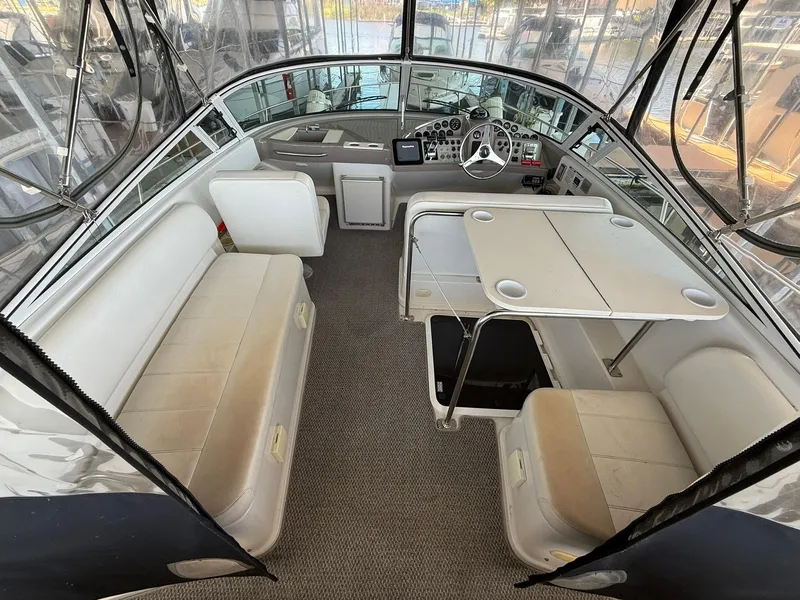 Slide: The Image of Interior of 2000 Carver 350 Mariner boat with seating and helm. - 9