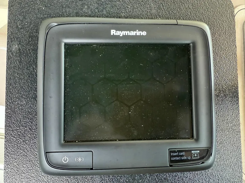 Slide: The Image of Raymarine marine display on Carver 350 Mariner 2000 boat dashboard. - 17