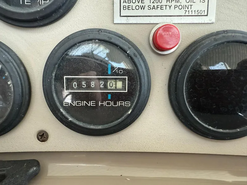 Slide: The Image of Engine hour meter showing 5820 hours on a 2000 Carver 350 Mariner. - 20