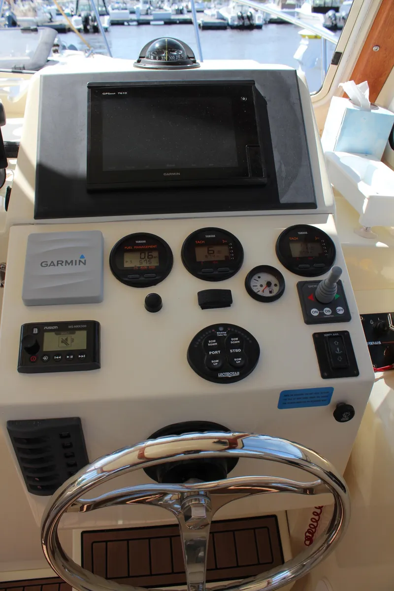 Slide: The Image of Control panel of a 2016 Eastern 27' Islander boat with Garmin navigation system. - 20