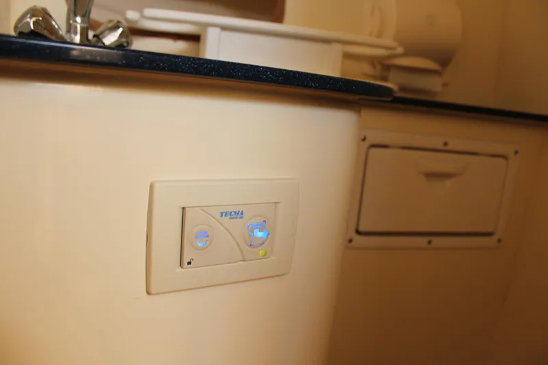 Slide: The Image of Control panel in the kitchen of a 2016 Eastern 27' Islander boat. - 28