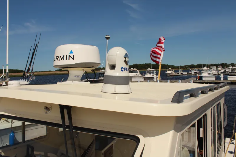 Slide: The Image of 2016 Eastern 27' Islander boat with Garmin and FLIR equipment on the roof. - 3