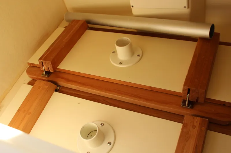 Slide: The Image of Interior view of 2016 Eastern 27' Islander boat with wooden and metal fittings. - 34