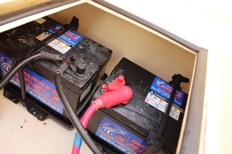 Slide: The Image of Marine batteries in a 2016 Eastern 27' Islander boat compartment. - 45