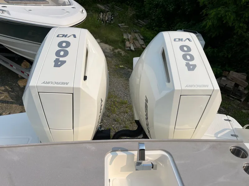 Slide: The Image of 2025 Boston Whaler 330 Vantage with twin Mercury 400 V8 engines. - 36