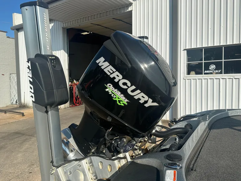 Slide: The Image of 2017 Nitro Z21 Z-Pro boat with Mercury outboard motor at a service center. - 17