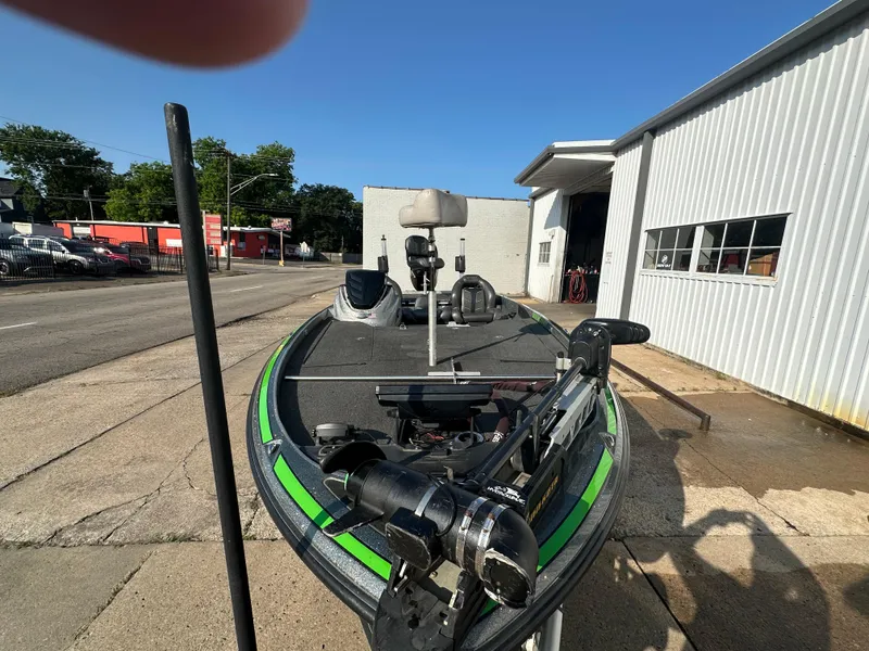 Slide: The Image of 2017 Nitro Z21 Z-Pro High Performance boat parked outside a garage. - 18