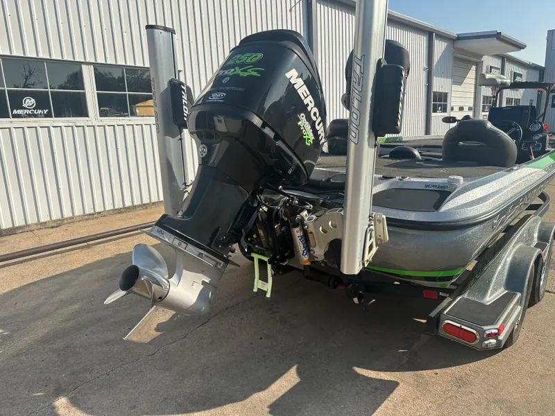 Slide: The Image of 2017 Nitro Z21 Z-Pro High Performance boat with Mercury engine, parked outside a building. - 5