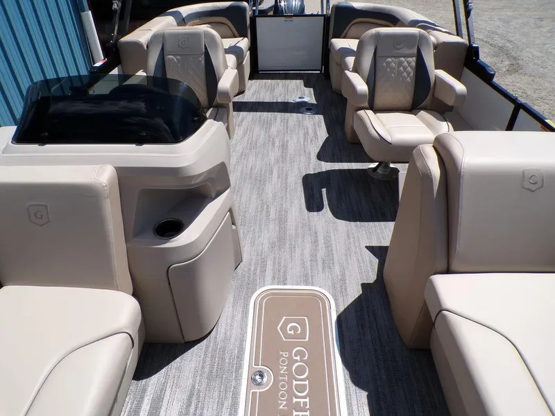 Slide: The Image of Luxurious 2025 Godfrey Sweetwater 2286 SB pontoon boat interior with plush seating. - 10