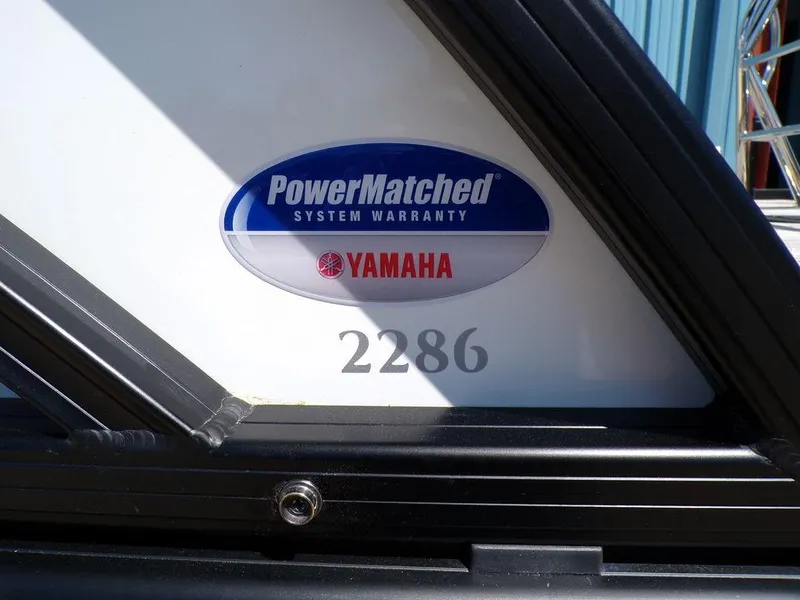 Slide: The Image of Yamaha PowerMatched System Warranty badge on Godfrey Sweetwater 2286 SB boat, 2025 model. - 13