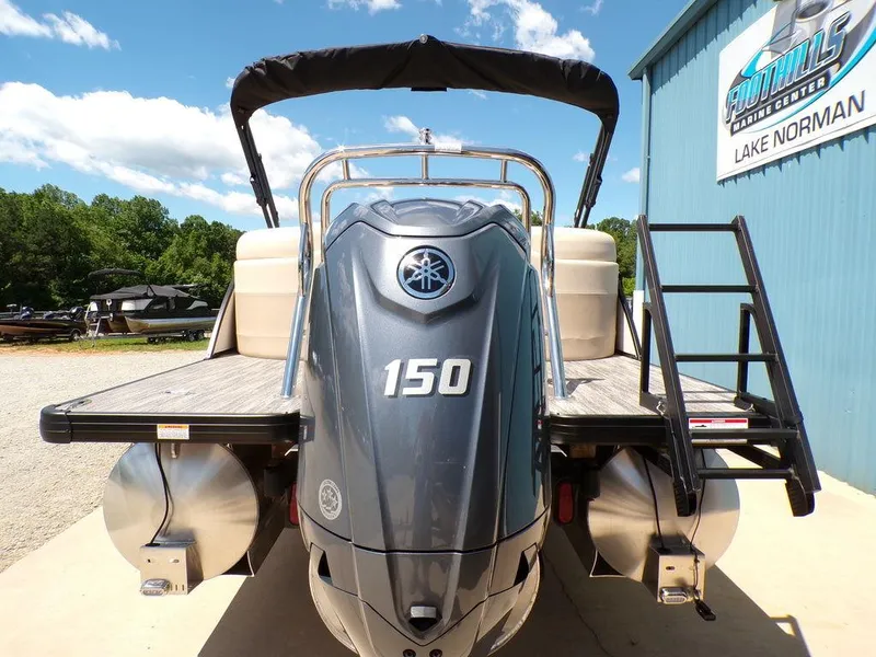 Slide: The Image of 2025 Godfrey Sweetwater 2286 SB pontoon boat with 150 HP engine at Lake Norman. - 15