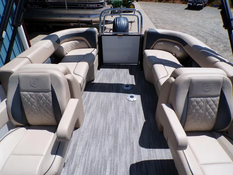 Slide: The Image of 2025 Godfrey Sweetwater 2286 SB pontoon boat with luxurious beige seating and spacious layout. - 4