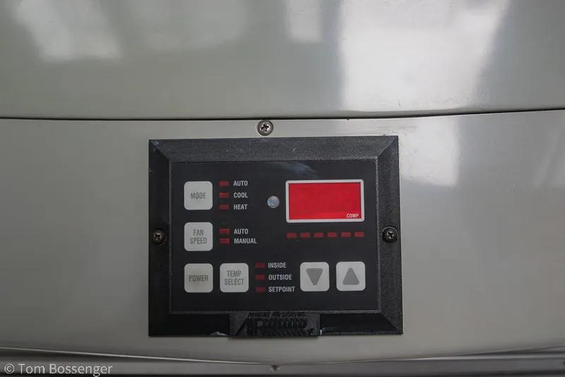 Slide: The Image of Control panel on a 1996 Mediterranean 38 Convertible boat, featuring temperature and mode settings. - 29