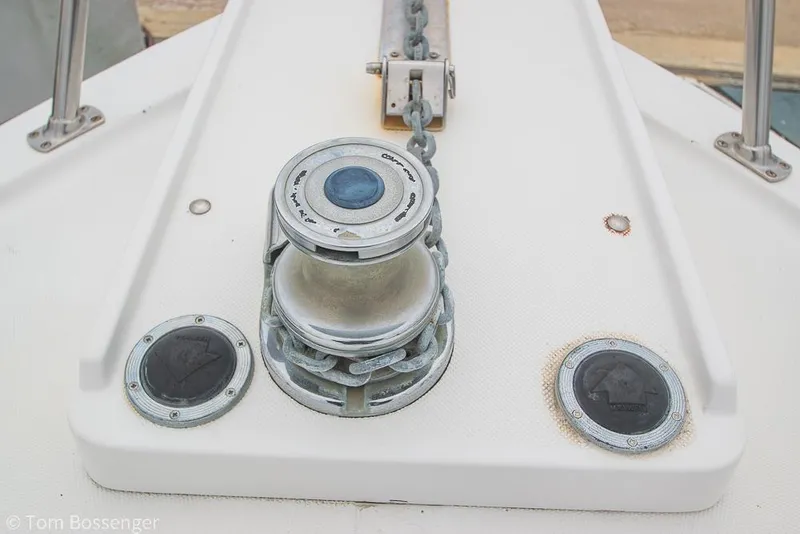 Slide: The Image of Anchor windlass on 1996 Mediterranean 38 Convertible boat deck. - 39