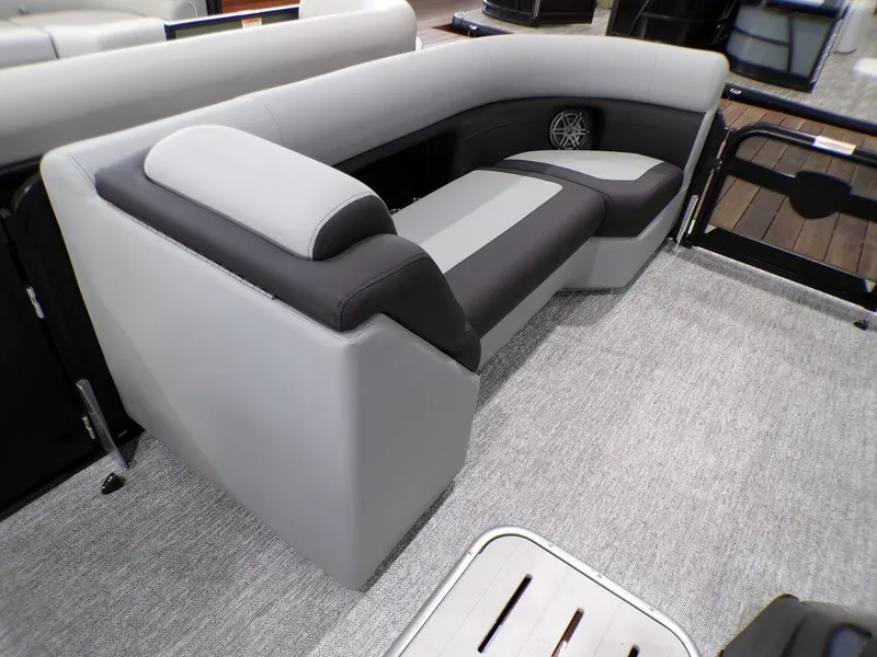 Slide: The Image of 2025 Premier 230 Sunsation RL boat interior with modern gray and black seating. - 15