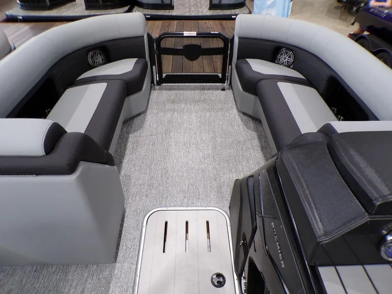 Slide: The Image of 2025 Premier 230 Sunsation RL boat interior with gray and black seating arrangement. - 16