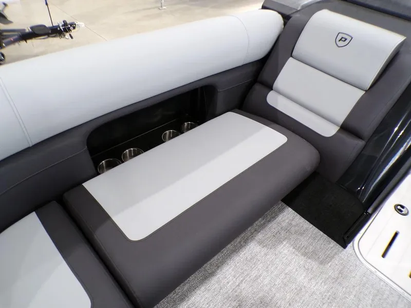 Slide: The Image of Luxurious seating in 2025 Premier 230 Sunsation RL boat, featuring sleek gray upholstery. - 17