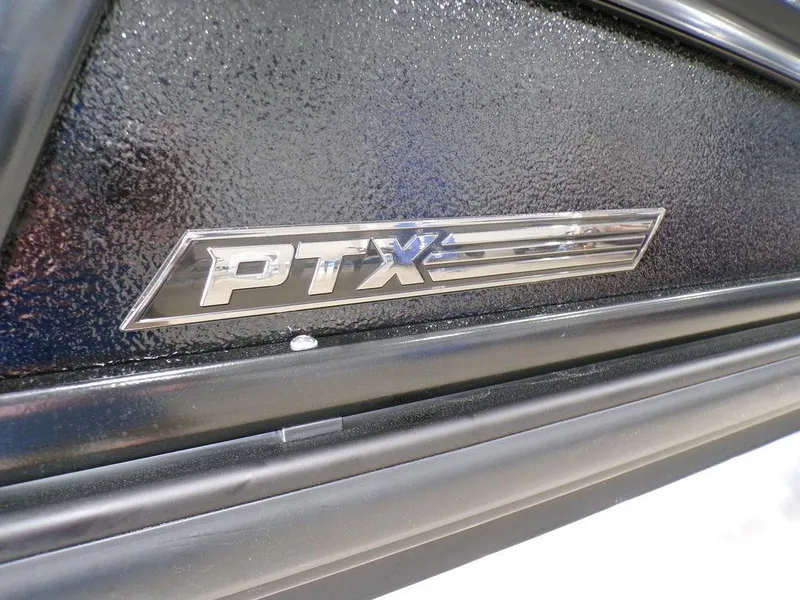 Slide: The Image of Close-up of PTX emblem on 2025 Premier 230 Sunsation RL boat. - 25
