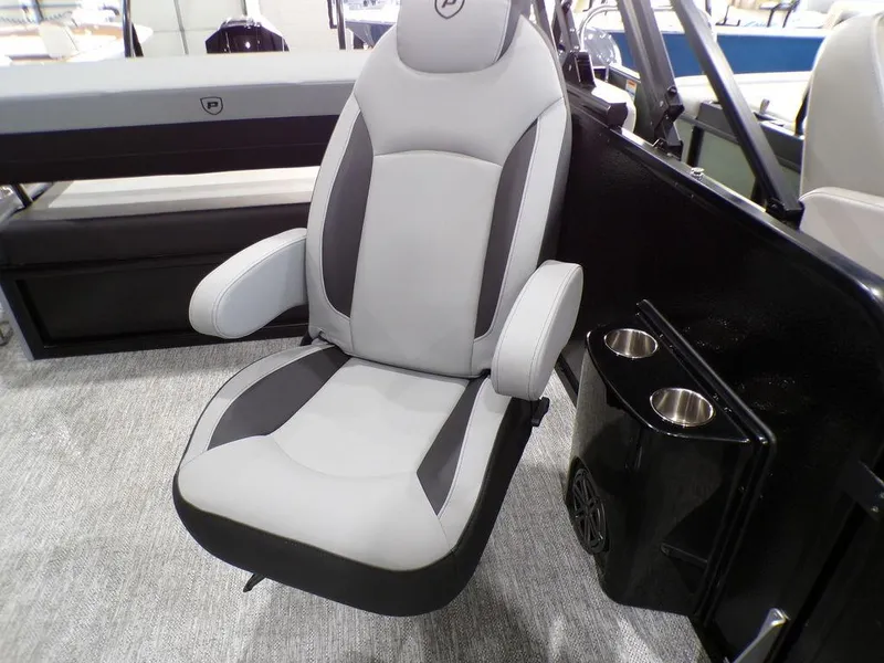 Slide: The Image of Premier 230 Sunsation RL 2025 boat seat with cup holders and modern design. - 31