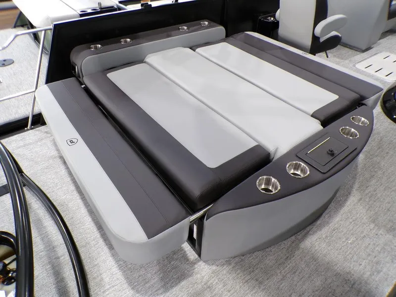 Slide: The Image of 2025 Premier 230 Sunsation RL boat interior with sleek seating and cup holders. - 6