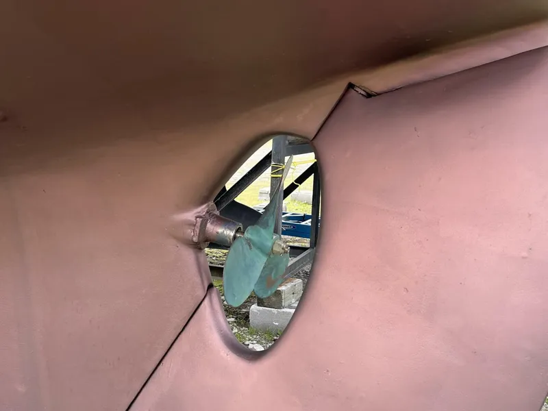 Slide: The Image of 1978 Cheoy Lee Offshore 33 propeller and hull detail, showcasing marine engineering. - 6