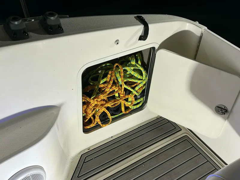 Slide: The Image of Storage compartment with ropes on a 2007 Sea Ray 280 Sundancer boat. - 15