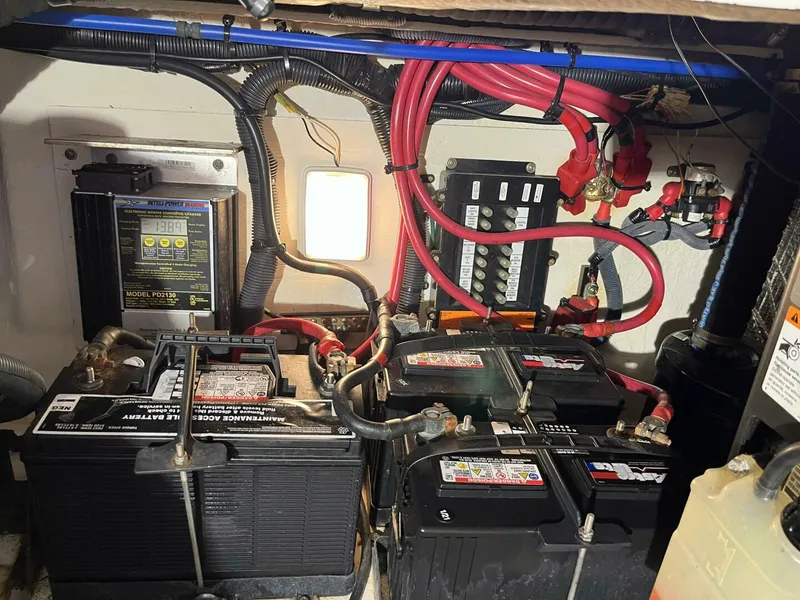 Slide: The Image of Electrical system of a 2007 Sea Ray 280 Sundancer with batteries and wiring. - 40