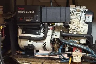 Slide: The Image of Onan Marine GenSet engine in a 1978 Grand Banks 36 Classic yacht. - 31