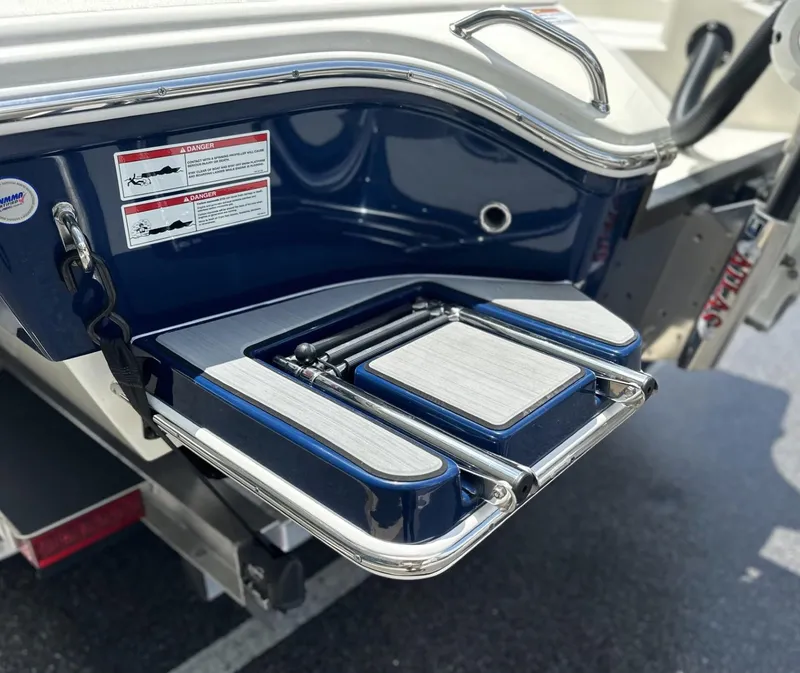 Slide: The Image of 2025 Pathfinder 2600 TRS boat swim platform with stainless steel details. - 11