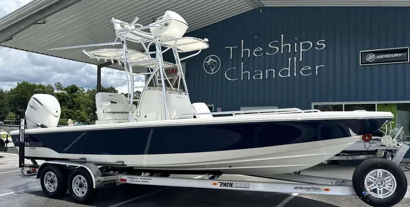 Slide: The Image of 2025 Pathfinder 2600 TRS boat on trailer at The Ships Chandler dealership. - 14