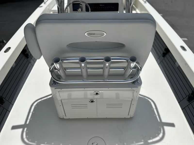 Slide: The Image of 2025 Pathfinder 2600 TRS boat interior with rod holders and storage compartment. - 6