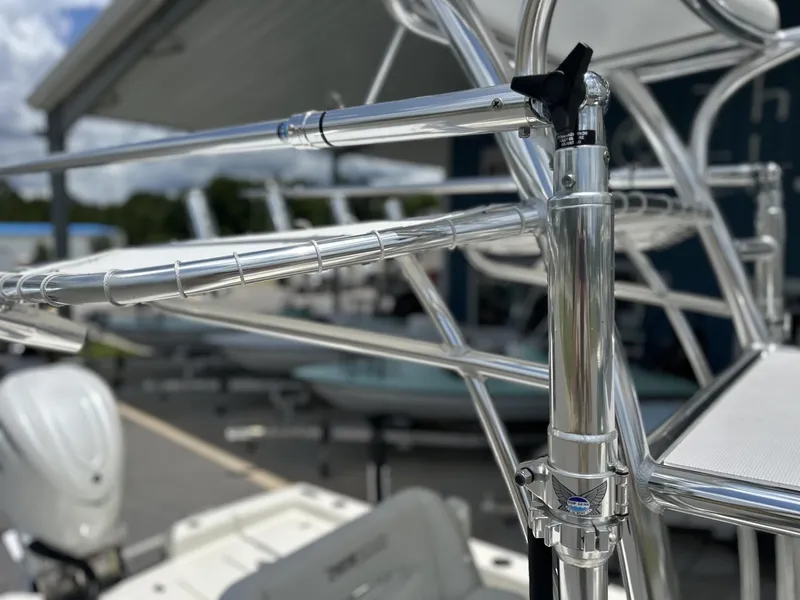 Slide: The Image of 2025 Pathfinder 2600 TRS boat with sleek metal framework and outdoor setting. - 7